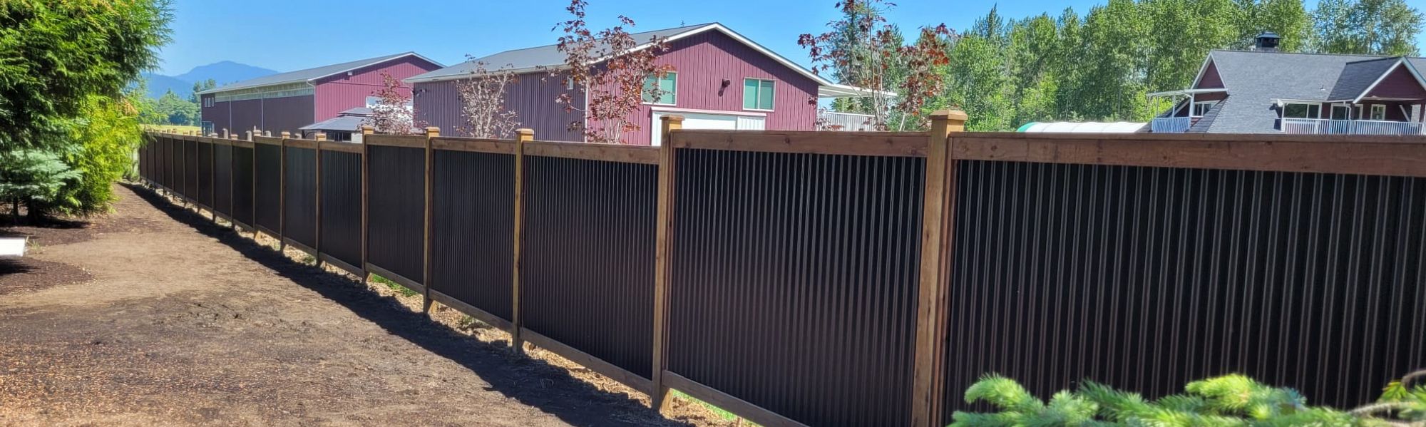 <span>Wood & Corrugated Metal</span> Fencing