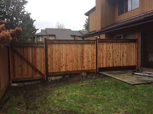 How do I waterproof my wood fence?