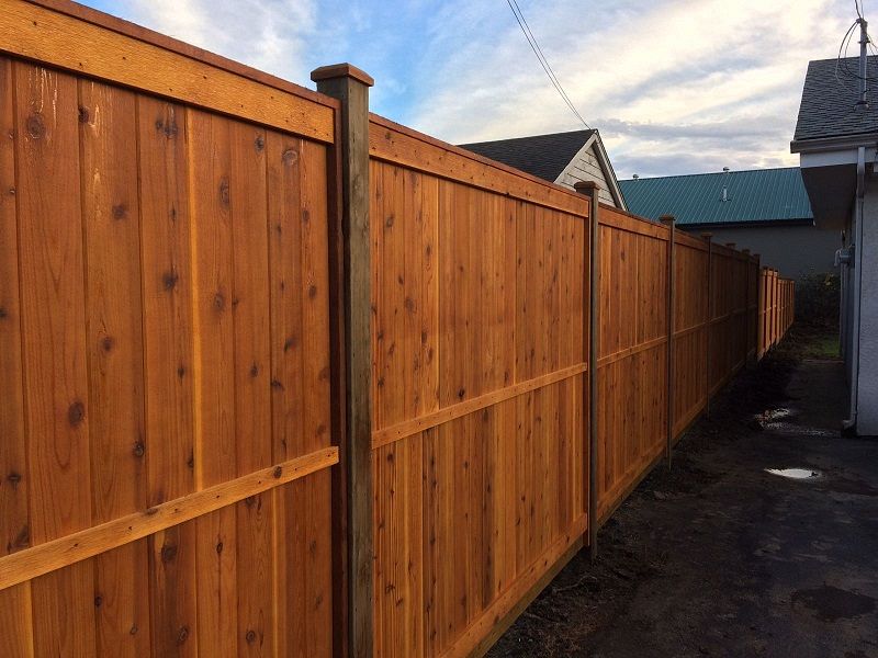 What is the best way to wash my wood fence?
