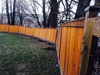 How can I protect my fence from wind damage?