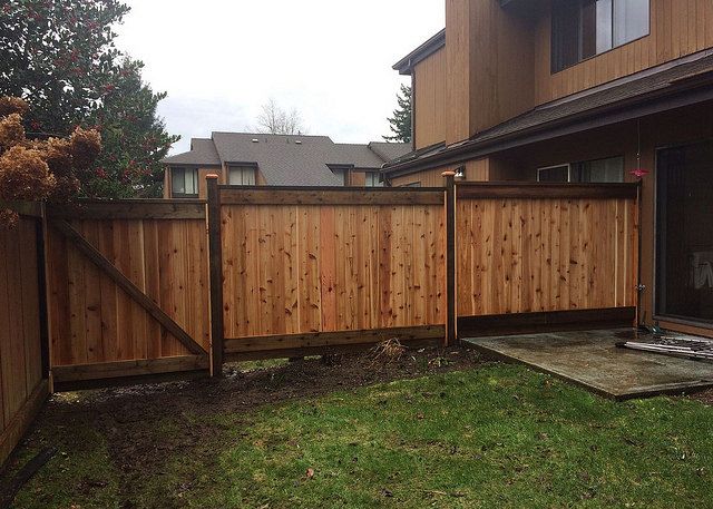 How do I waterproof my wood fence?